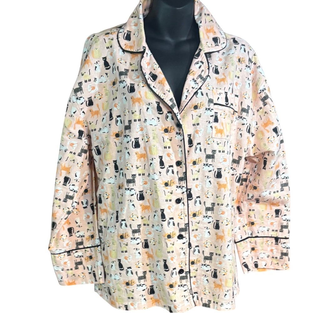 long-sleeved cats button-down pajama top is from the brand Yarn & Sea